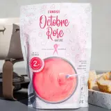Un sachet de fondue au rosé "Octobre Rose" aux motifs de rubans roses, prêt à être dégusté avec du pain.