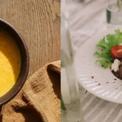 Velouté de potimarron et sa garniture de graines, et une assiette de rôti froid avec salade et tomates, parfaits pour une entrée chaude mariage.